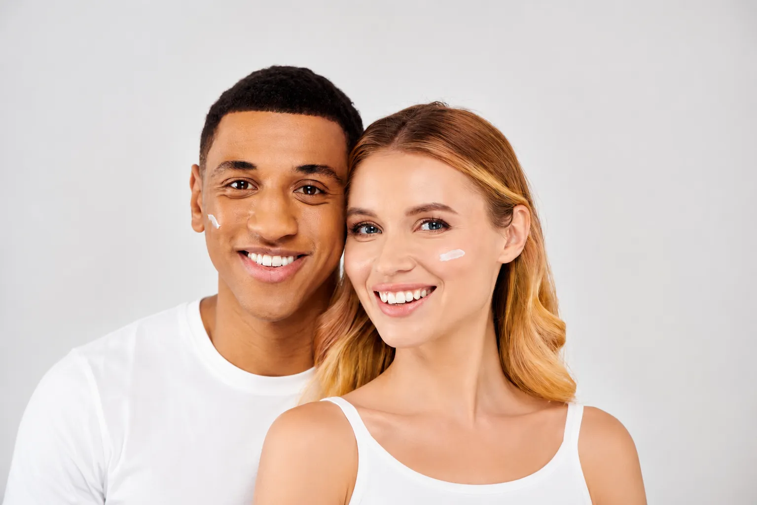 man and woman smiling