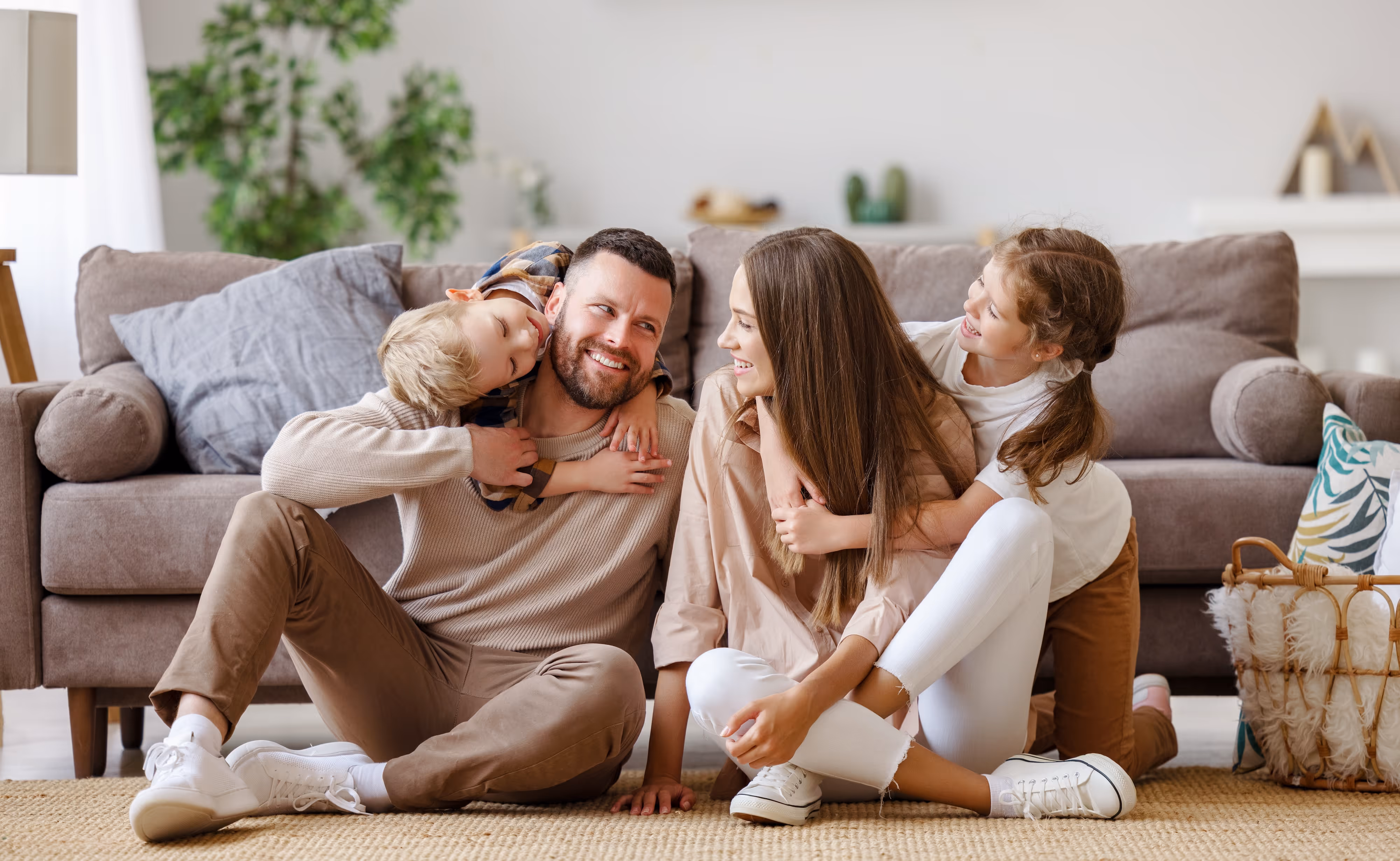 Family hugging stock image