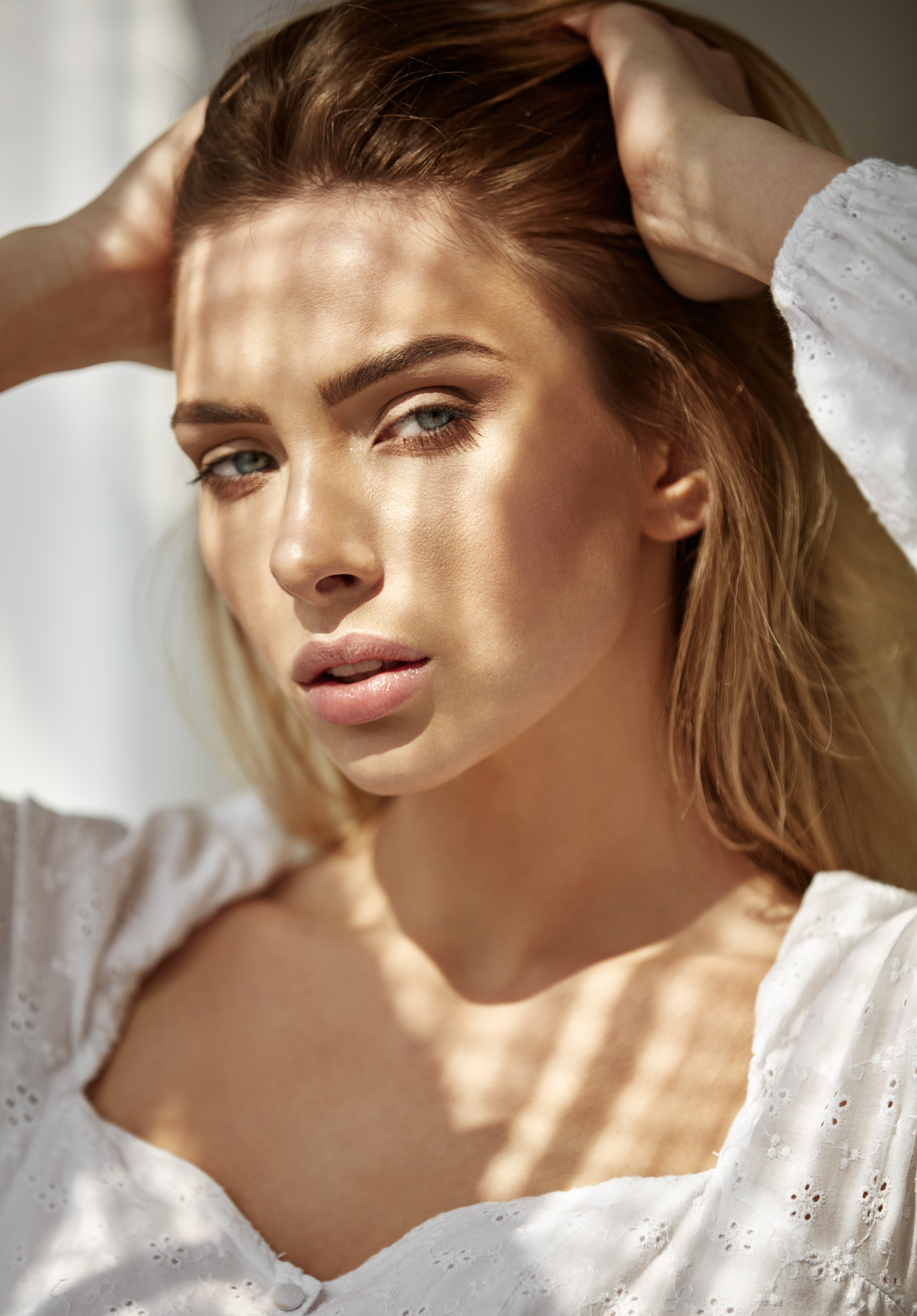 Smiling woman with lifted, glowing skin after a Prime RF treatment