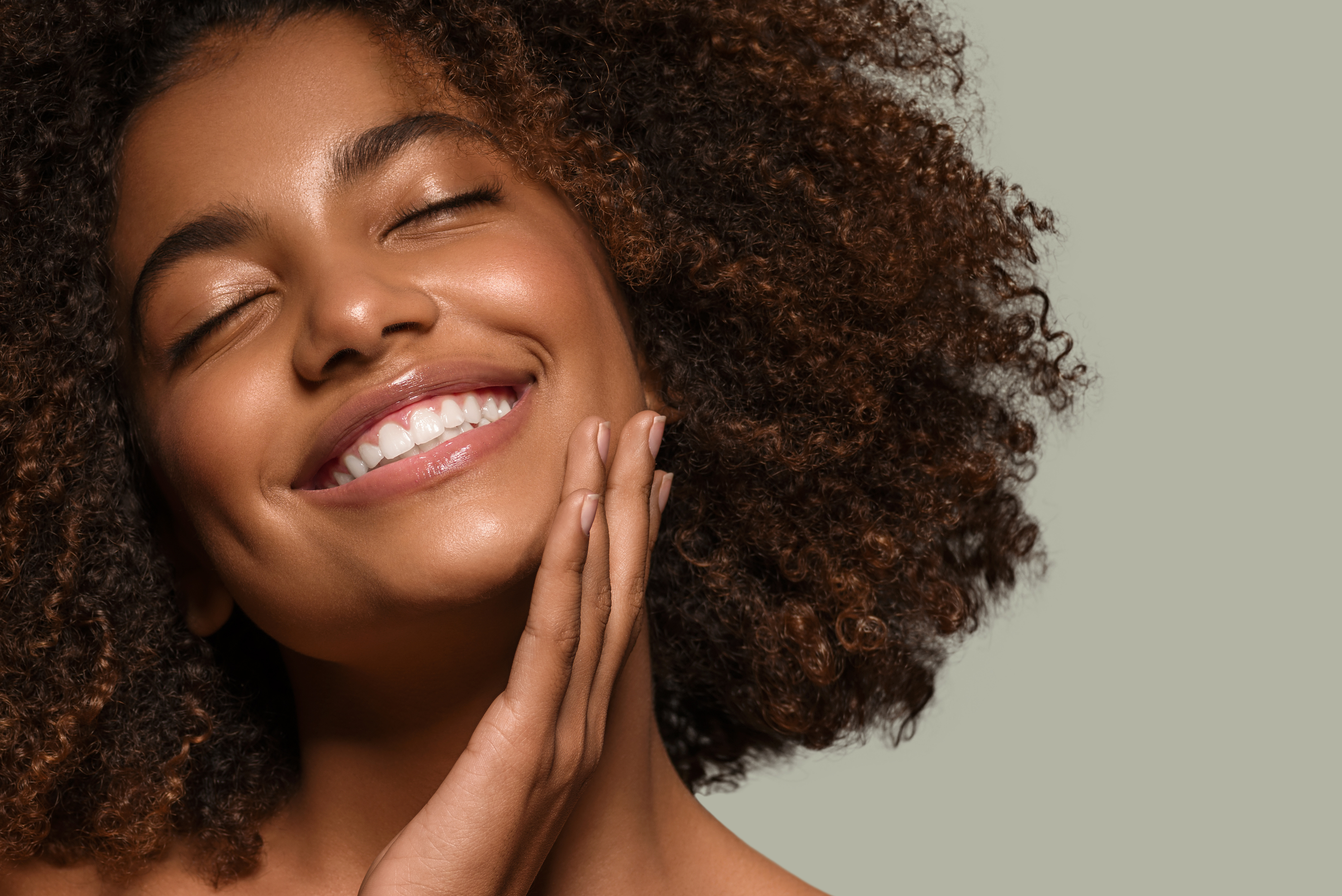 Confident woman with refreshed, sculpted facial contours