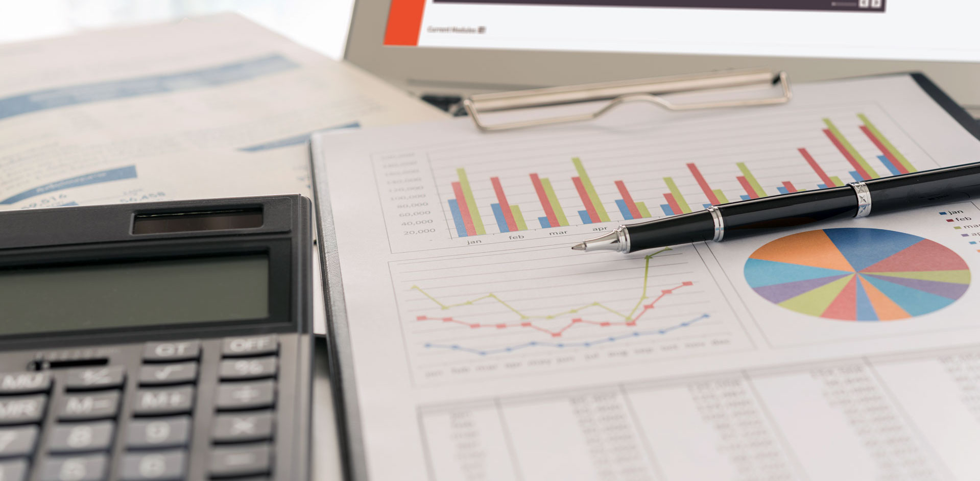 A calculator and page with graphs