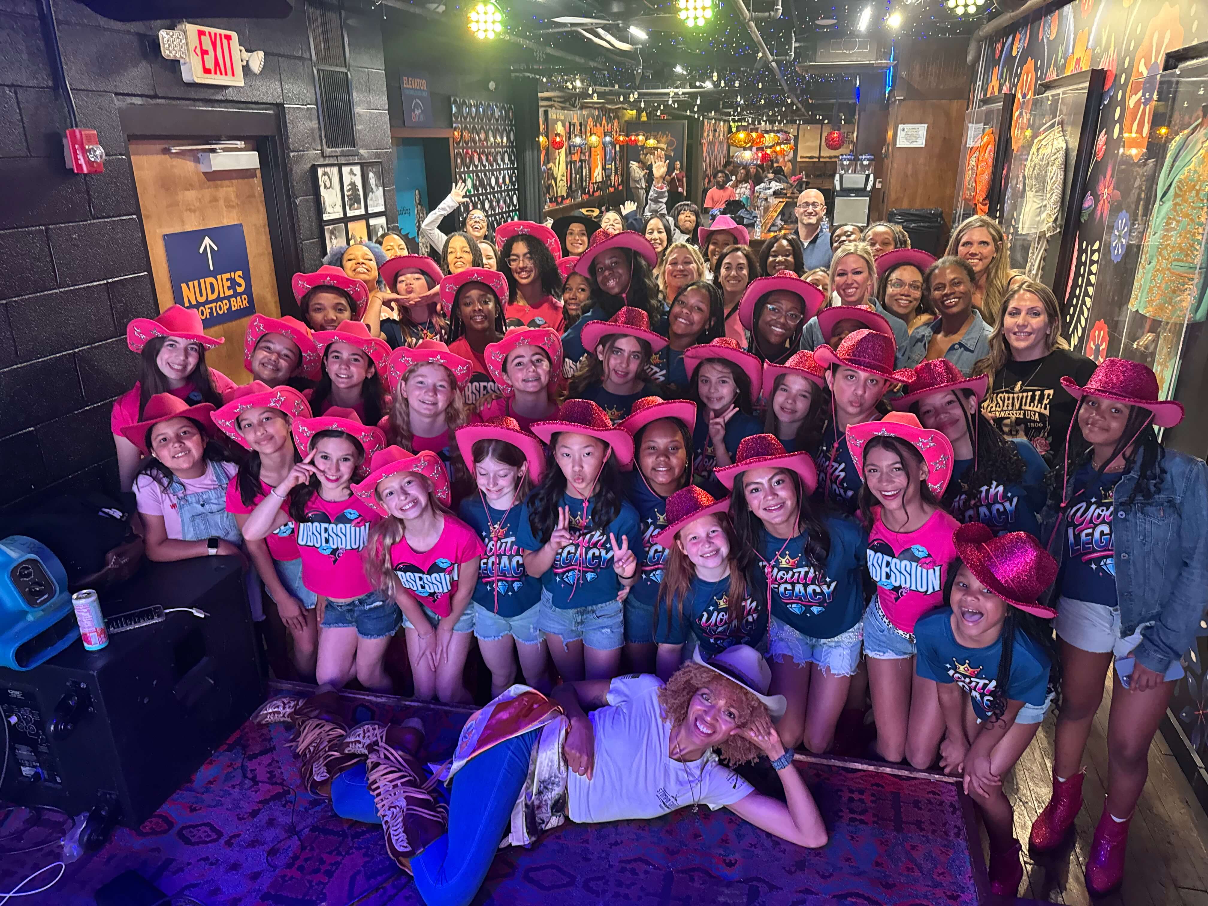 Group posing together after a dance event img