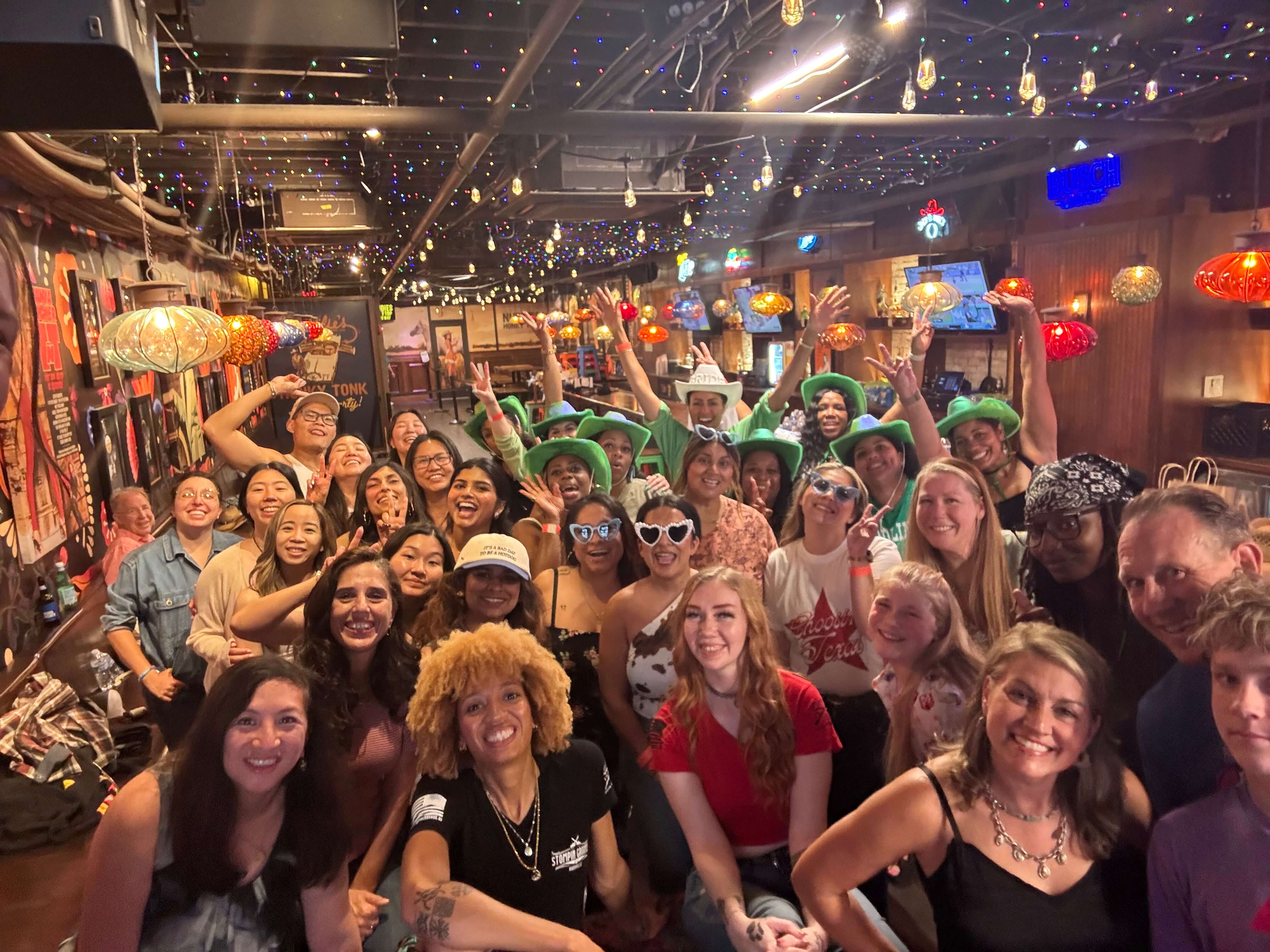 Group celebrating together at a country dance event img