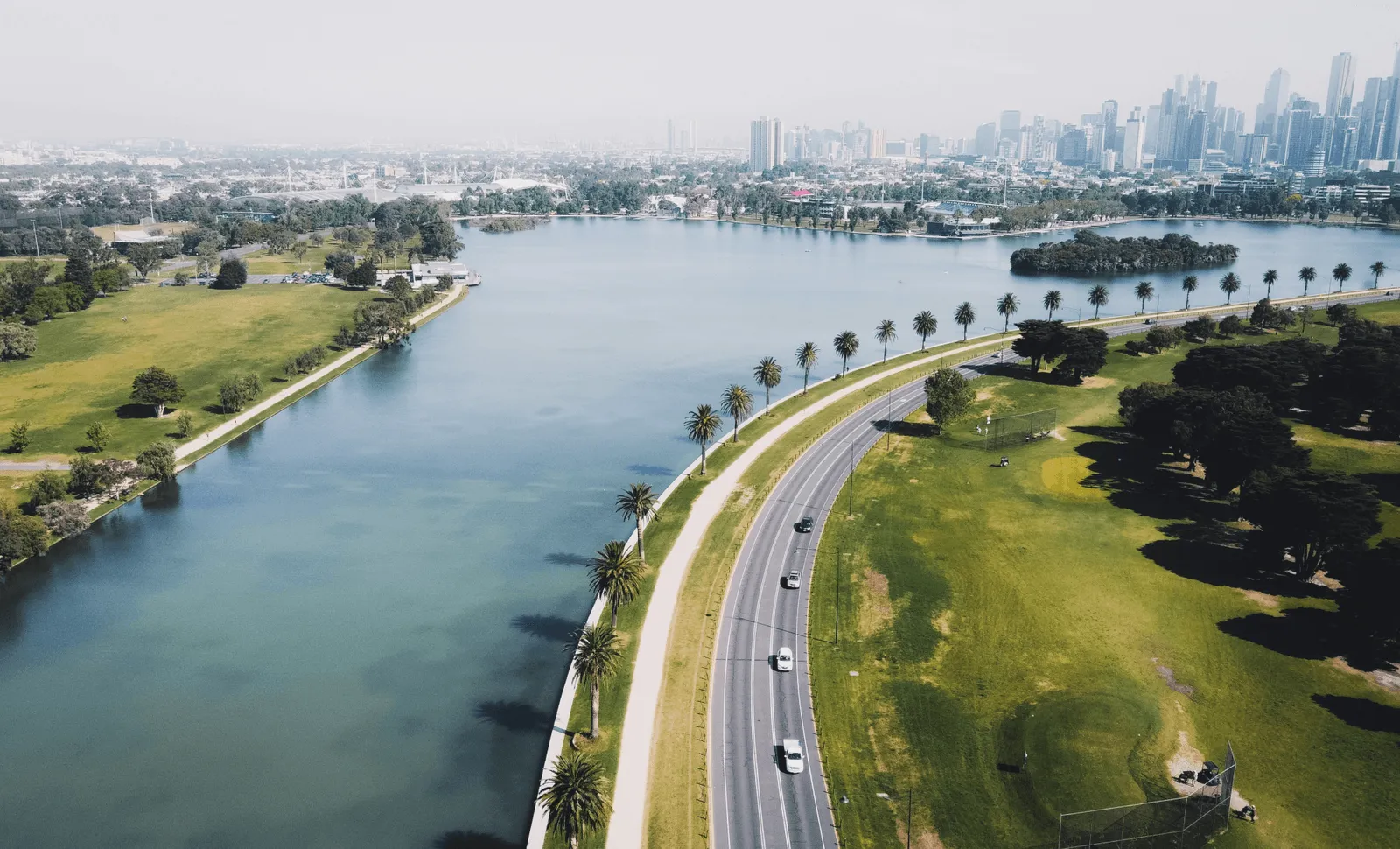 an aerial view of a city and a river