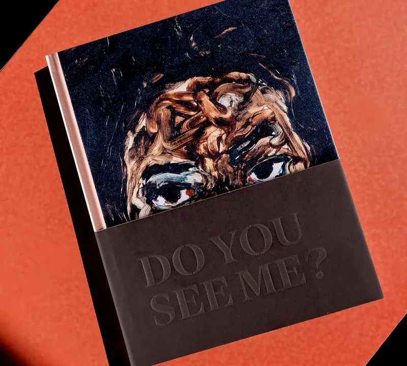 A photograph of the hardcover book lying flat.