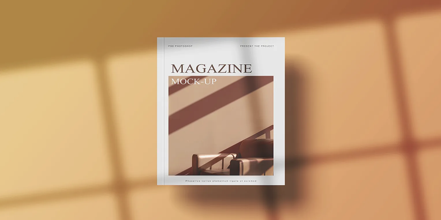 Magazine mock-up featuring shadows of a chair and railing on a beige surface.