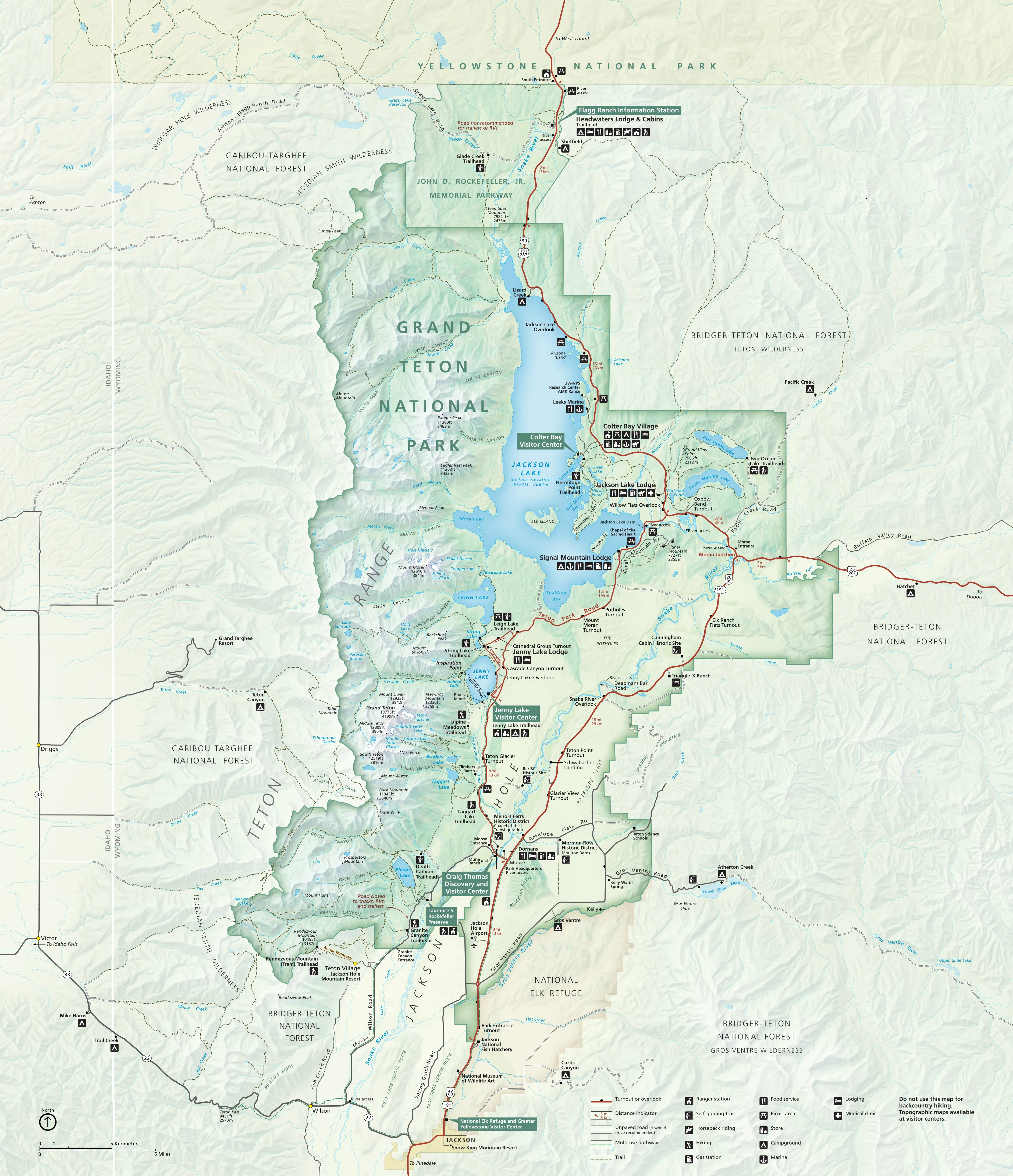 Detailed map of Grand Teton National Park showing trails, roads, visitor centers, and landmarks.