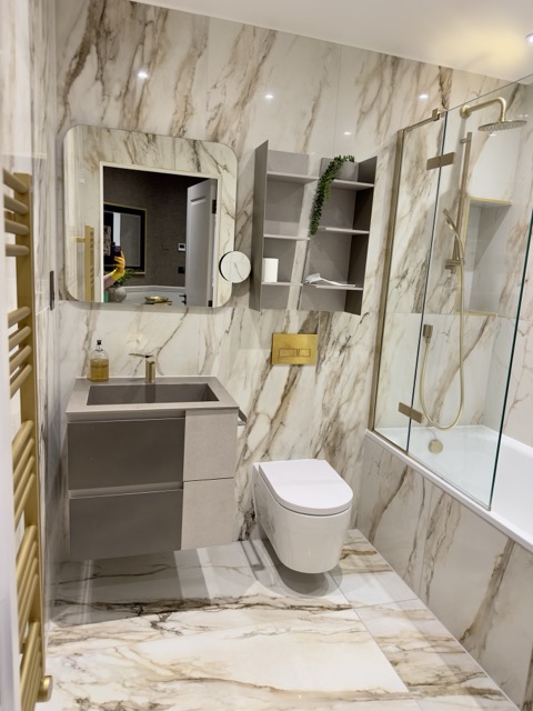 Luxury marble bathroom post-construction cleaning by Tidy Hub