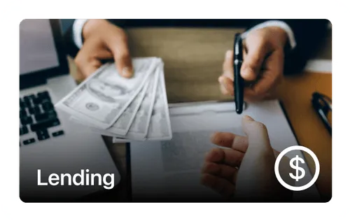 Person handing over cash while another prepares to sign a document, labeled Lending.