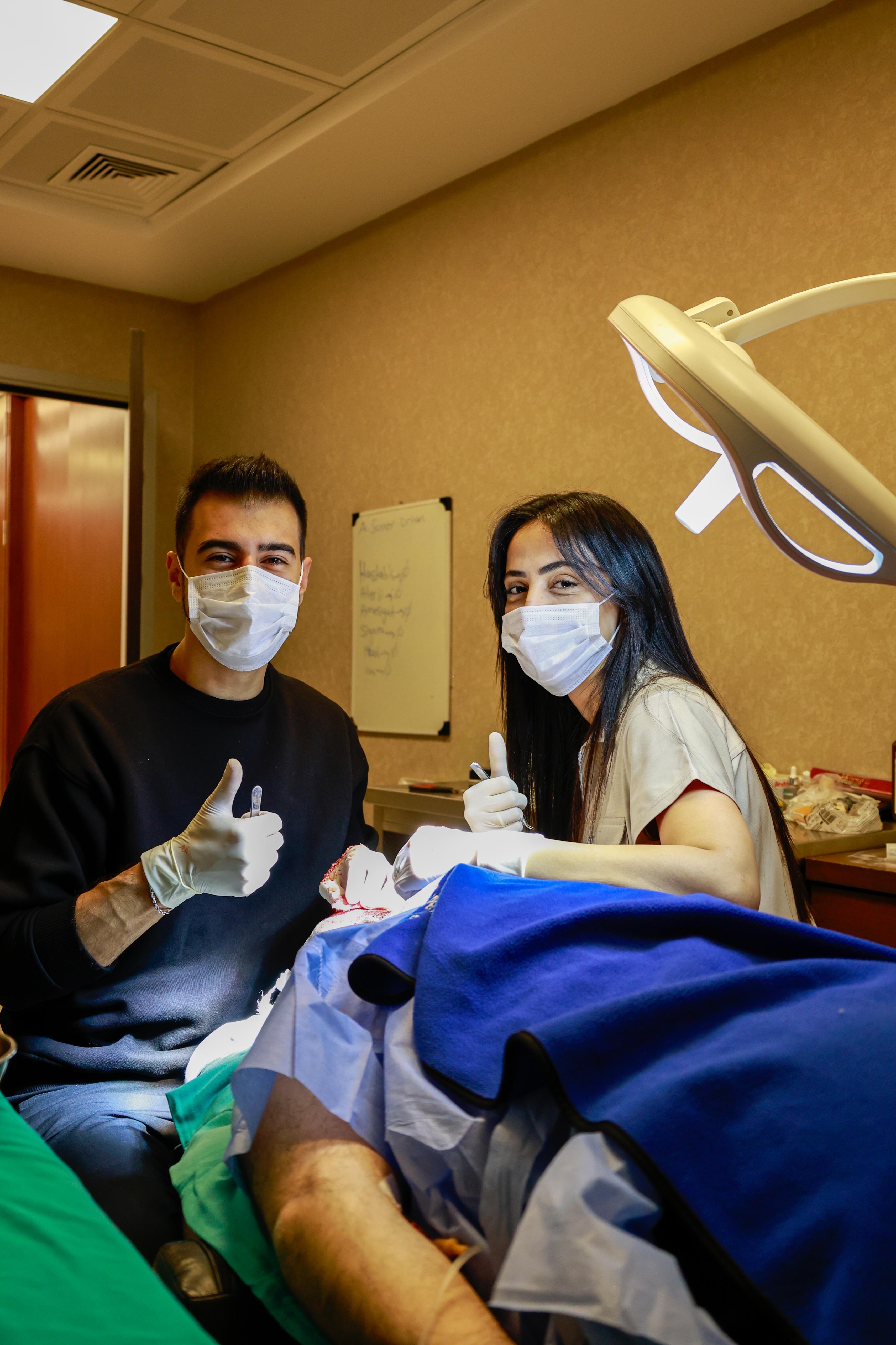 image of a dentist with a patient