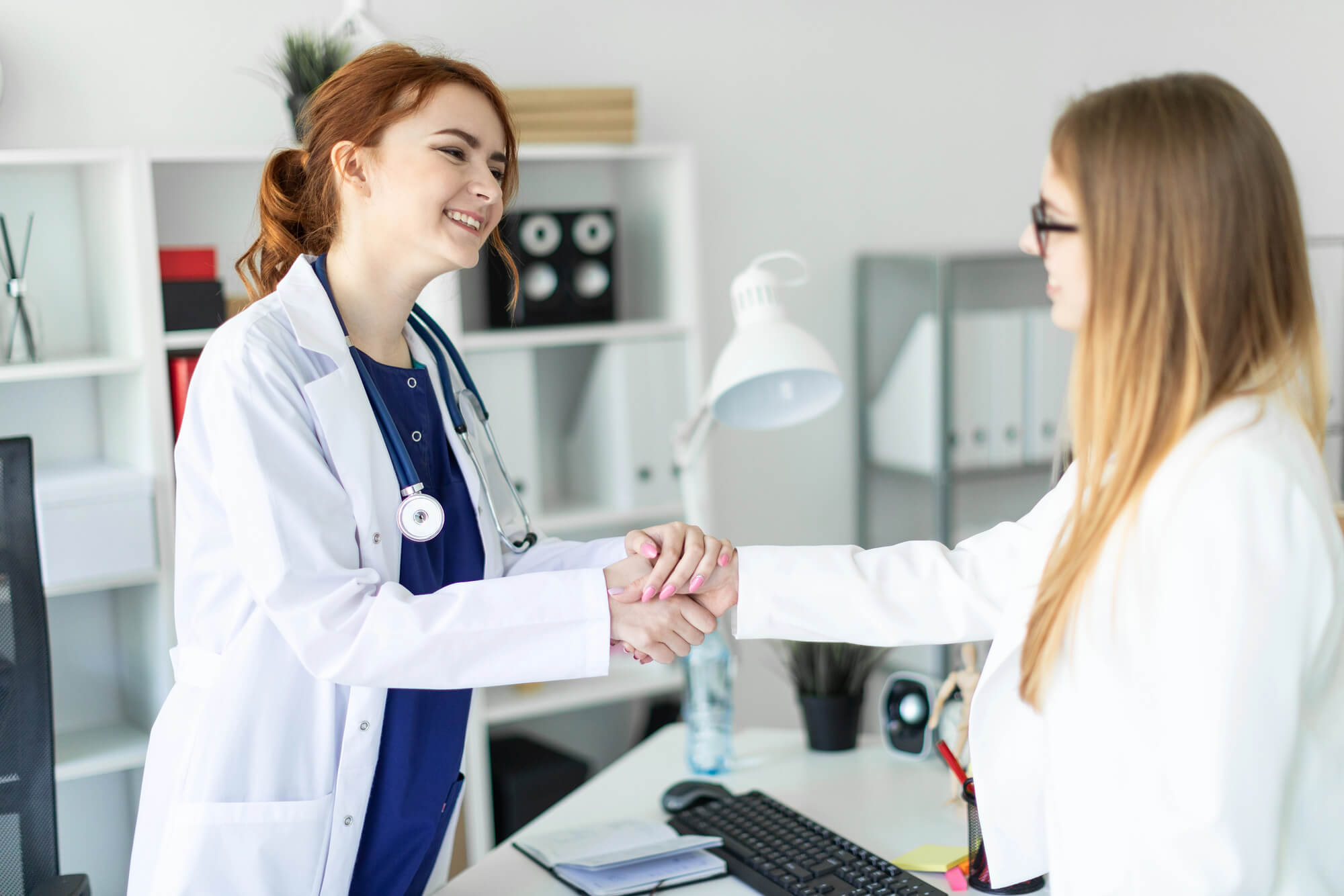 shaking hands with a Medical Lease Negotiator 