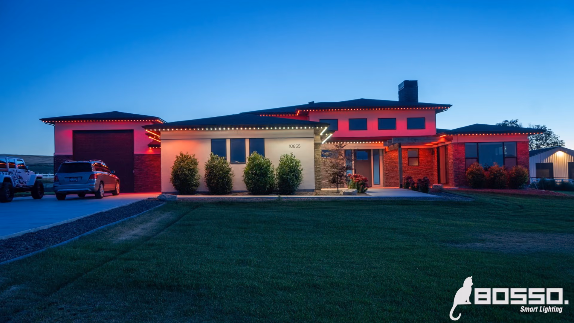 Permanent outdoor lighting system illuminating a house