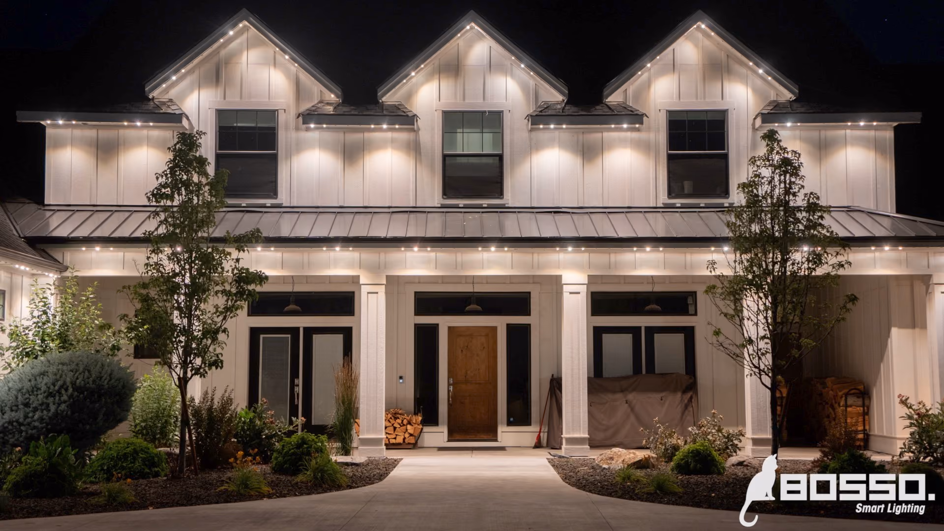 Warm white architectural lighting illuminating a house