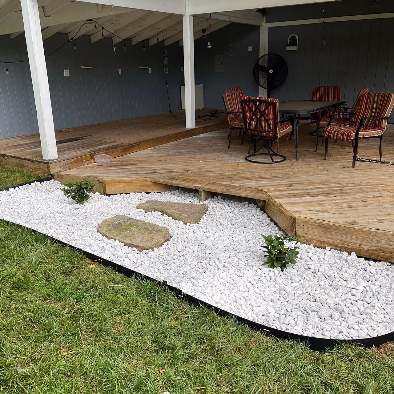 stone walkway and outdoor living space design Oakwood Landscape & Design