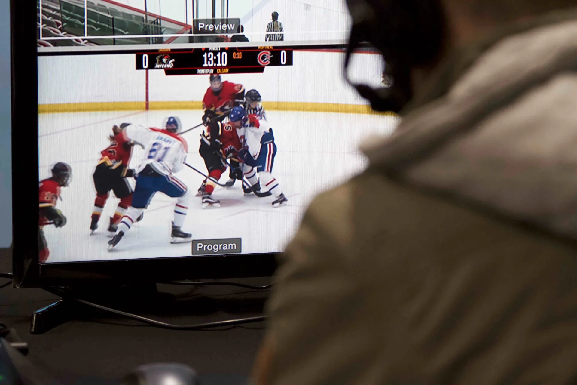 a screenshowing the broadcast view of the hockey game being recorded