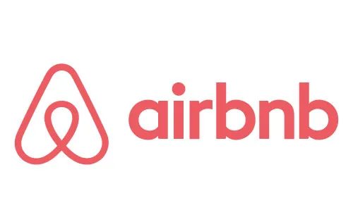 Airbnb company logo in red text with a stylized A symbol.