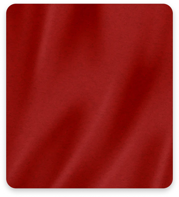 Close-up of smooth red fabric texture with subtle folds and shadows.