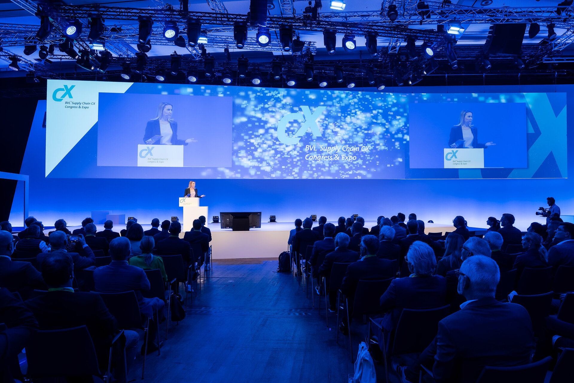 Main Stage keynote to a packed audience at BVL Supply Chain CX, with on-screen branding reading "BVL Supply Chain CX Congress & Expo".