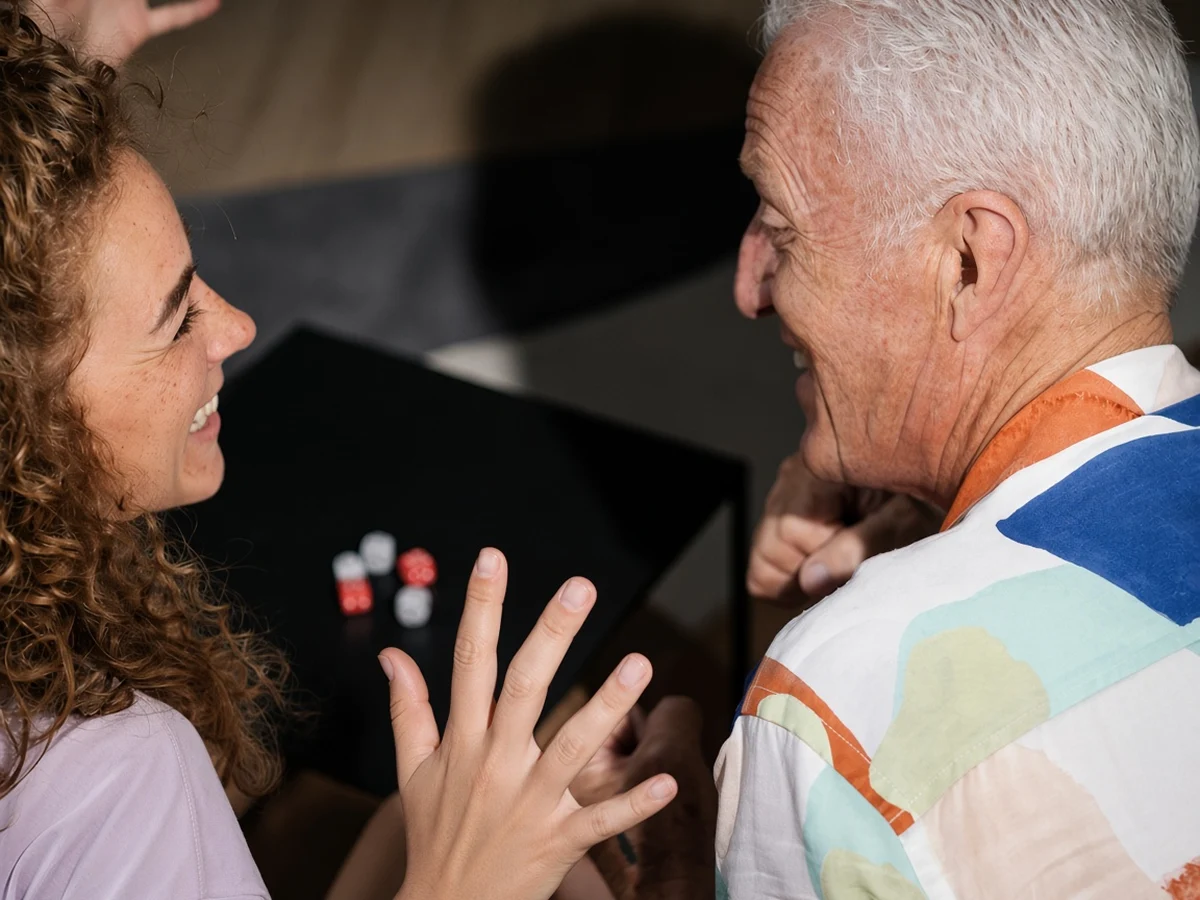 Caregiver talking with an older man