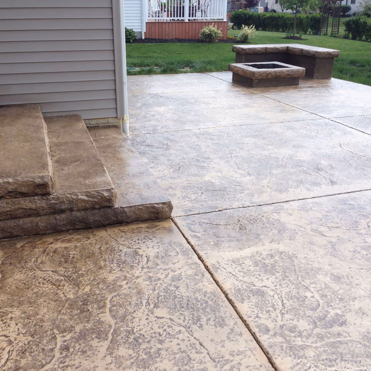 Paver patio outdoor living space by Landa Construction Services
