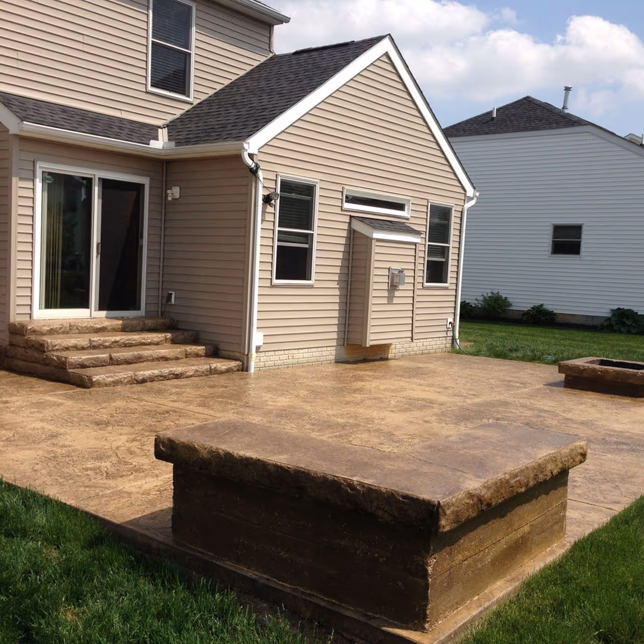 Decorative colored concrete patio with custom finish