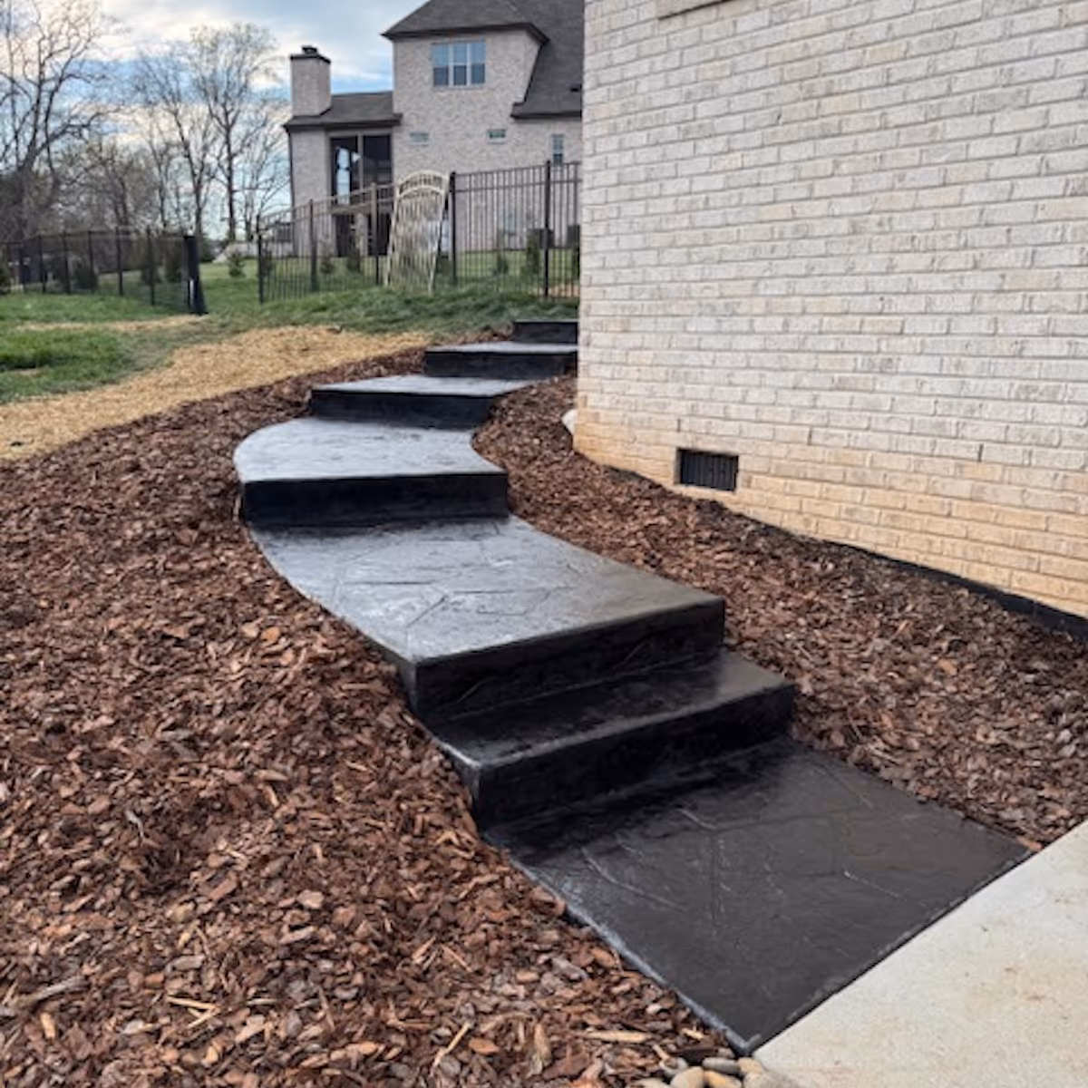 Homeowner choosing Landa Construction Services for reliable concrete, landscaping, and remodeling with quality craftsmanship and honest communication.