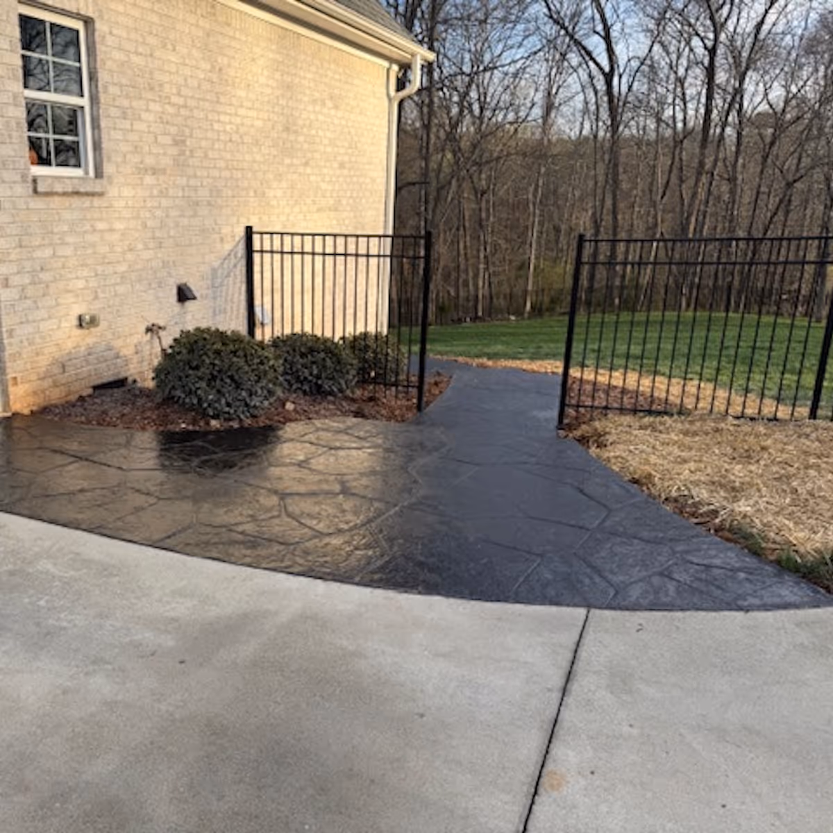 Professional concrete work for residential property improvement by Landa Construction Services
