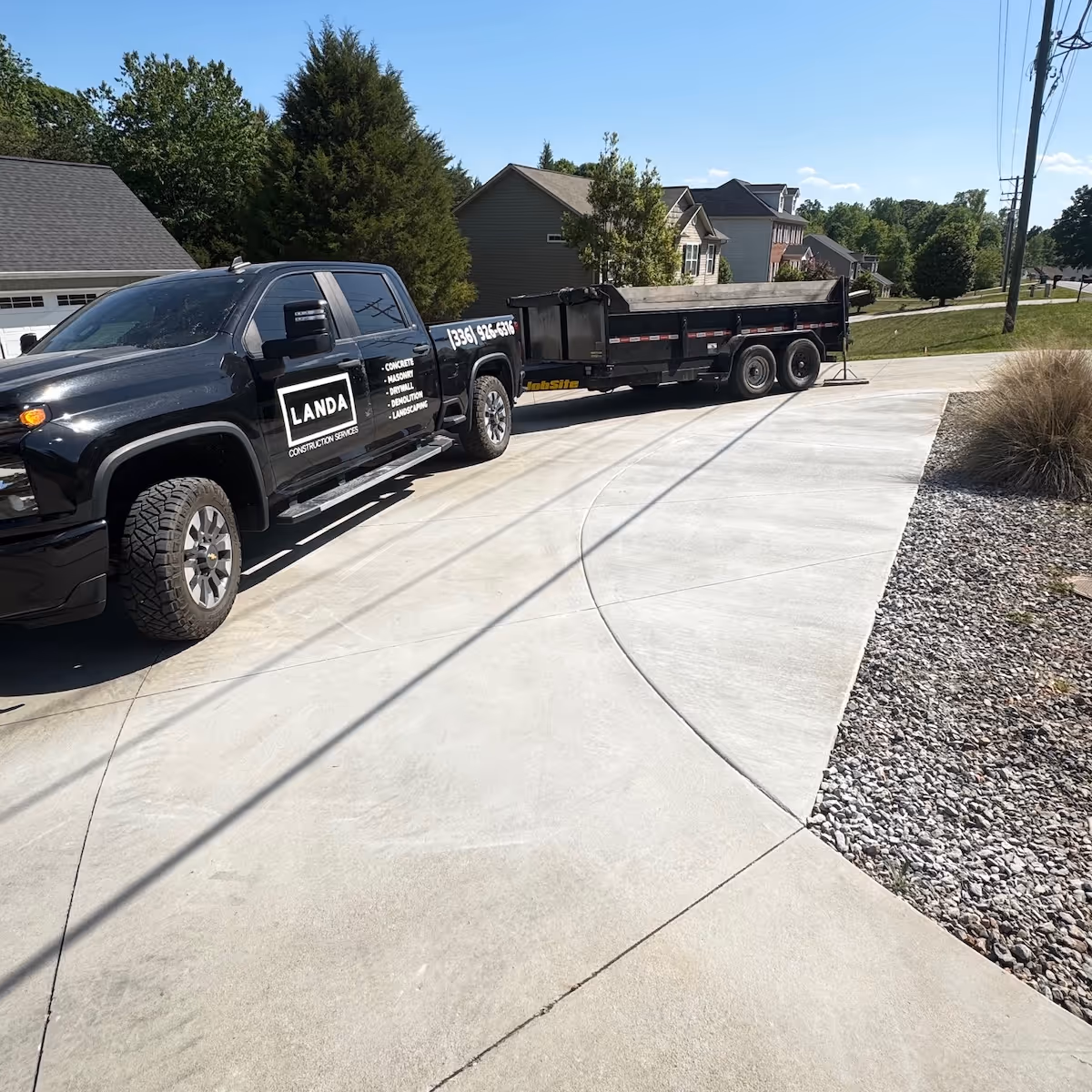 Concrete driveway installation with a clean finish and lasting durability by Landa Construction Services.