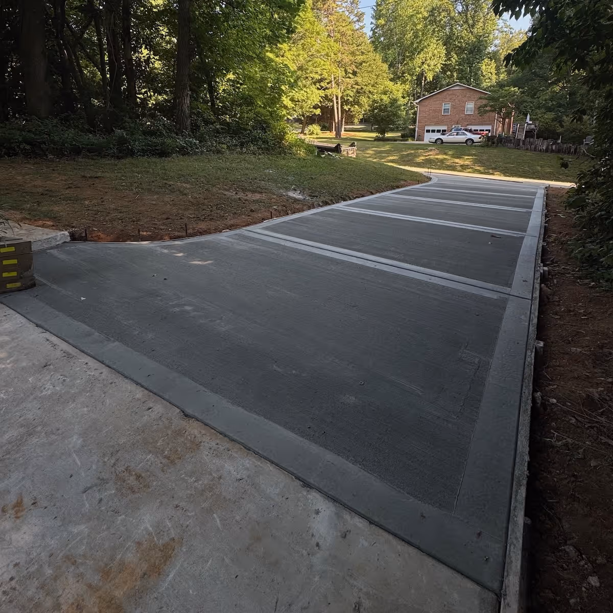 Professionally installed concrete driveway built for durability, functionality, and long-term performance by Landa Construction Services.