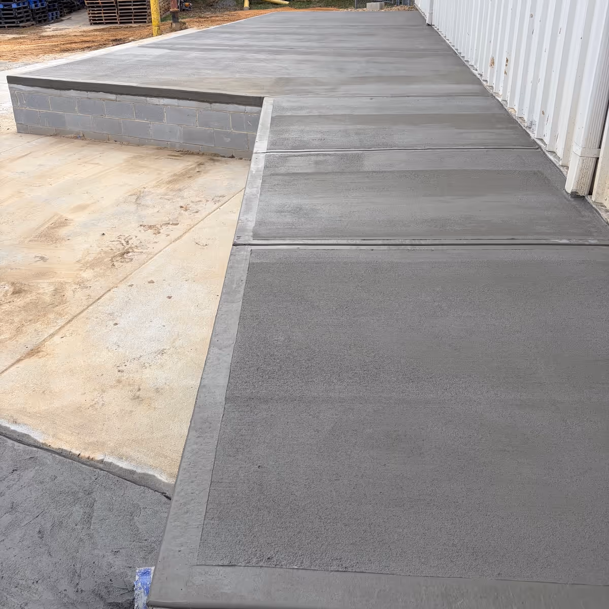 Commercial unloading dock installation designed for safe, efficient loading operations and long-term durability by Landa Construction Services.