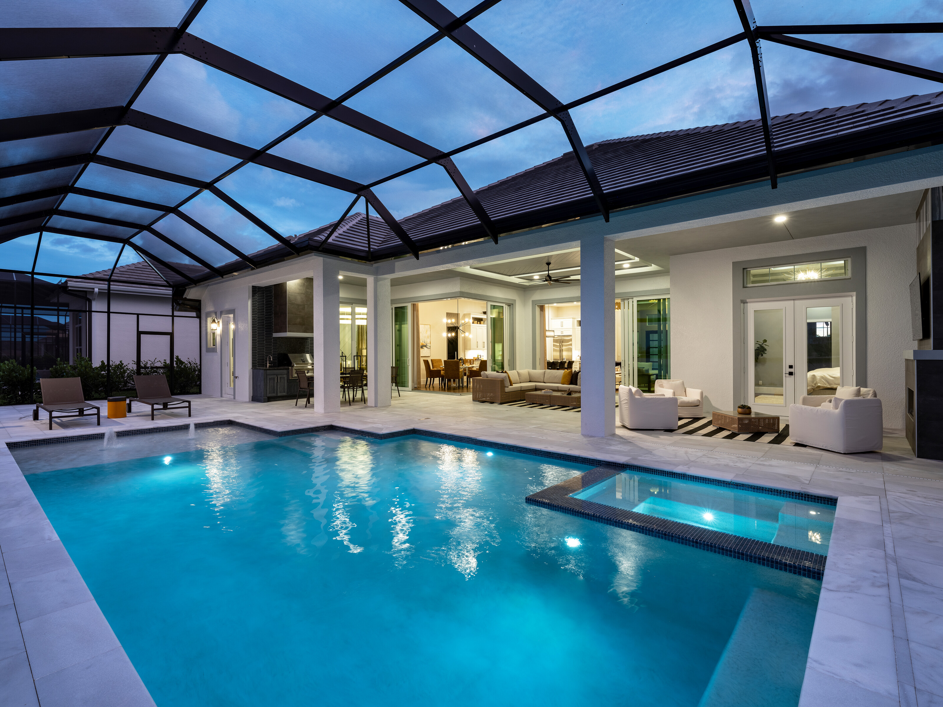 Geometric spa paver pool dusk