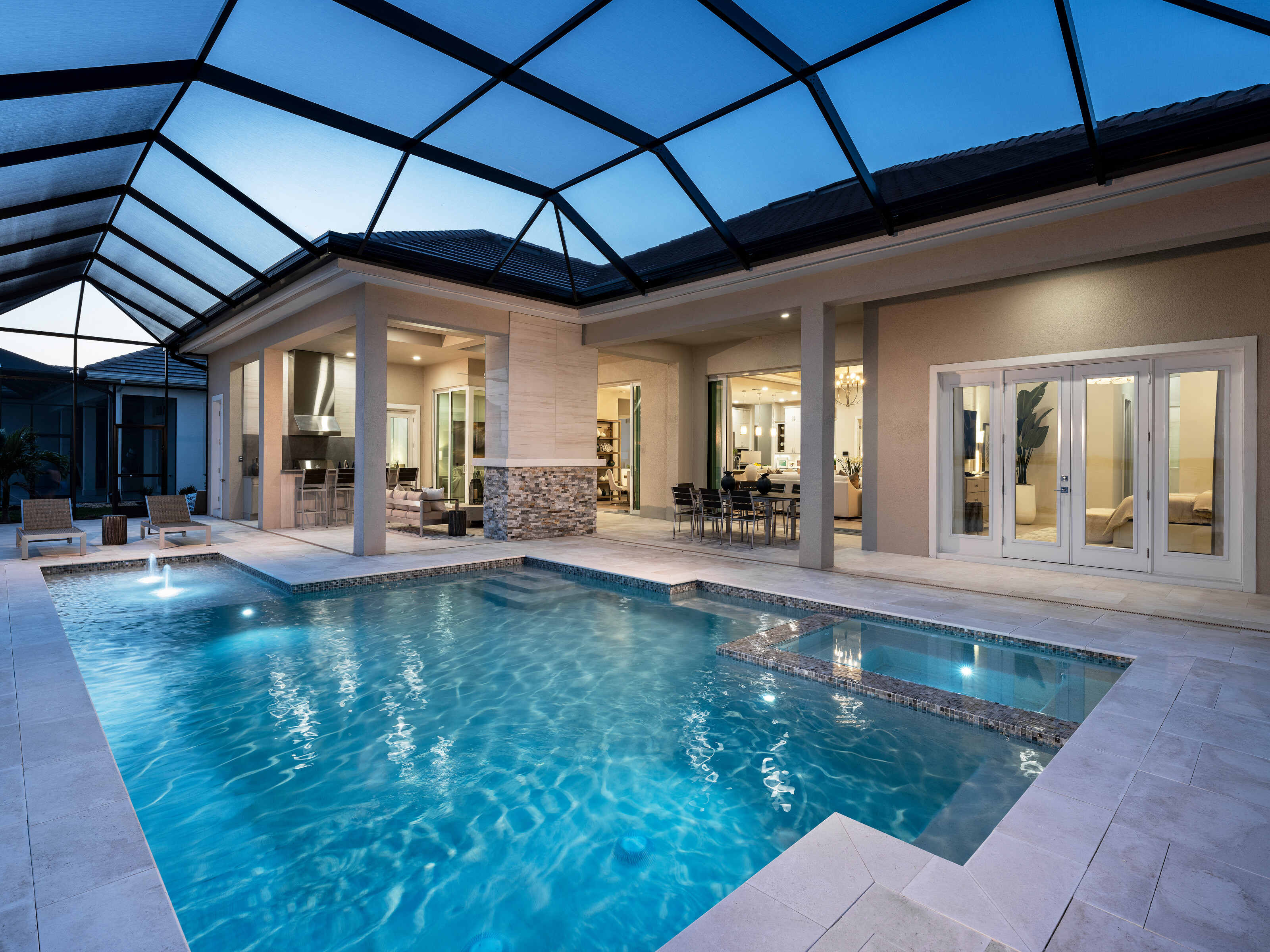 Screened pool and spa dusk