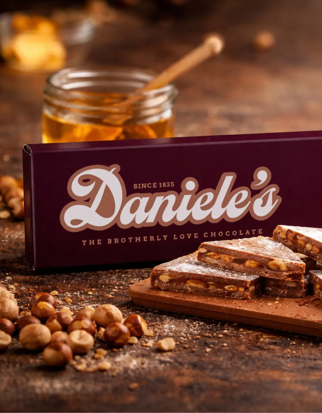 A pack of Daniele's Soft Chocolate on a table surrounded by ingredients