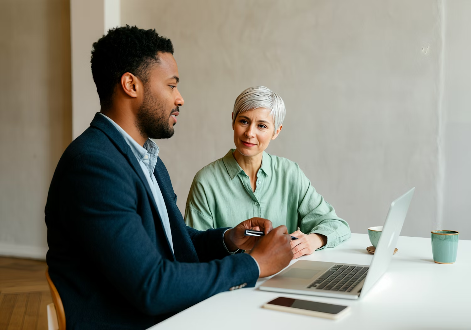 An advisor meeting with a healthcare professional, representing collaborative partnerships and strategic healthcare investing.