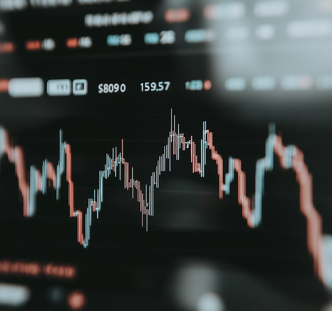 Close-up of a financial market chart on a screen representing evaluation of business performance and fundamentals.