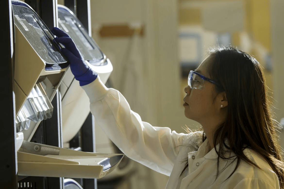 Clinical professional in a laboratory setting, representing NeuMed’s commitment to high-quality urgent care and diagnostic services.