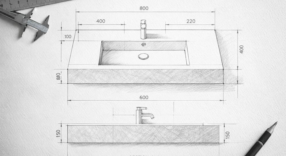 Technical drawing of a rectangular sink with detailed dimensions and measurements, accompanied by a caliper and a pencil on textured paper.