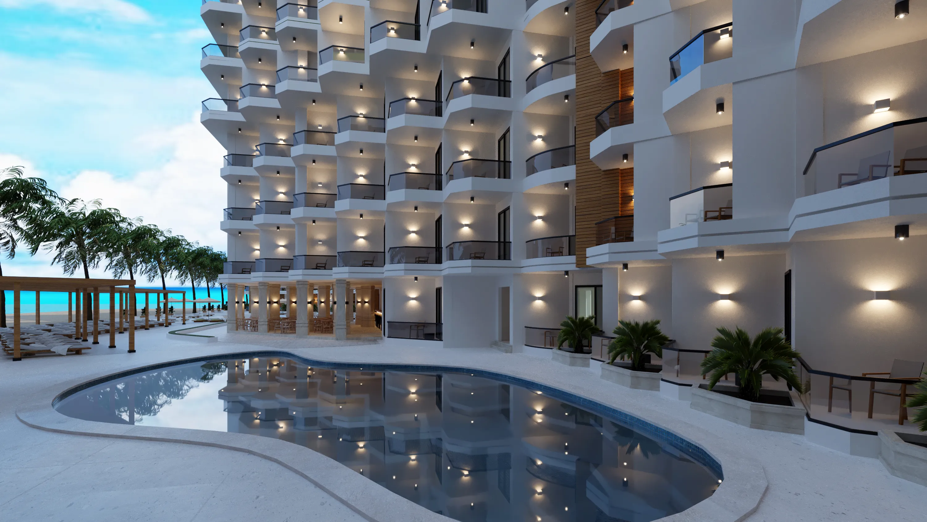 Modern resort building with balconies and outdoor lights reflecting in a large pool beside a beachfront with palm trees and lounge chairs.
