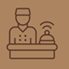 Brown icon of a receptionist wearing a uniform and cap standing behind a desk with a bell.