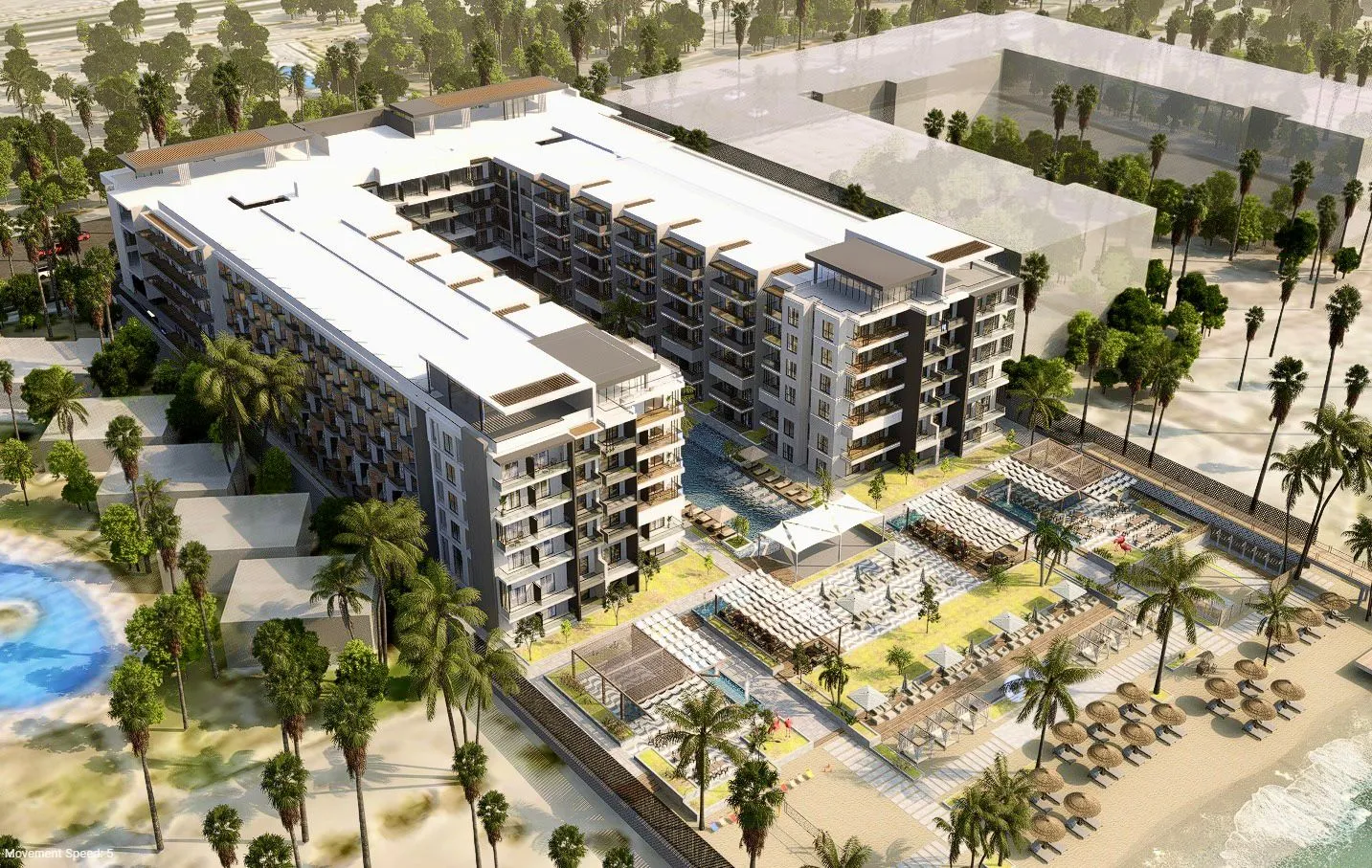 Aerial view of a modern beachfront resort with apartment buildings, a swimming pool, palm trees, shaded lounge areas, and beach umbrellas along the shoreline.