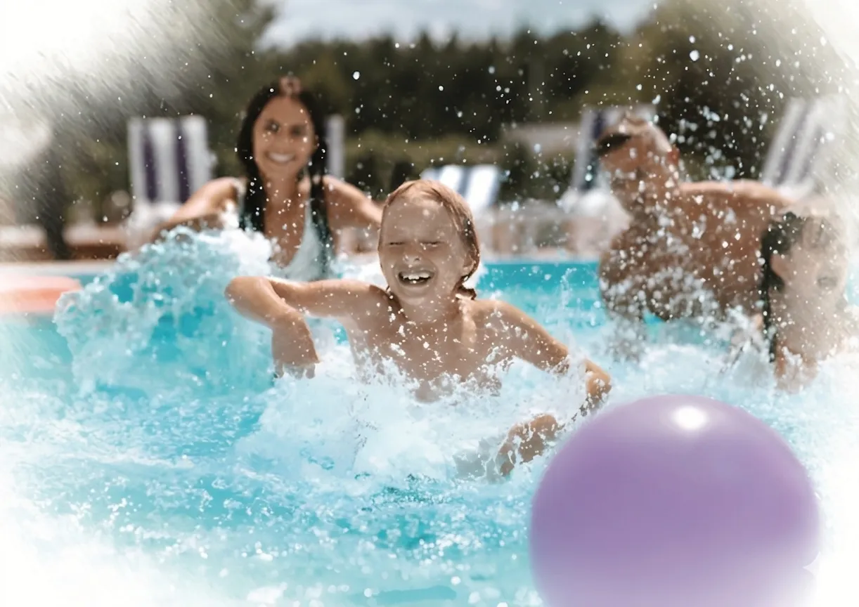 Smiling child splashing in a pool with three adults and a purple ball in the water.