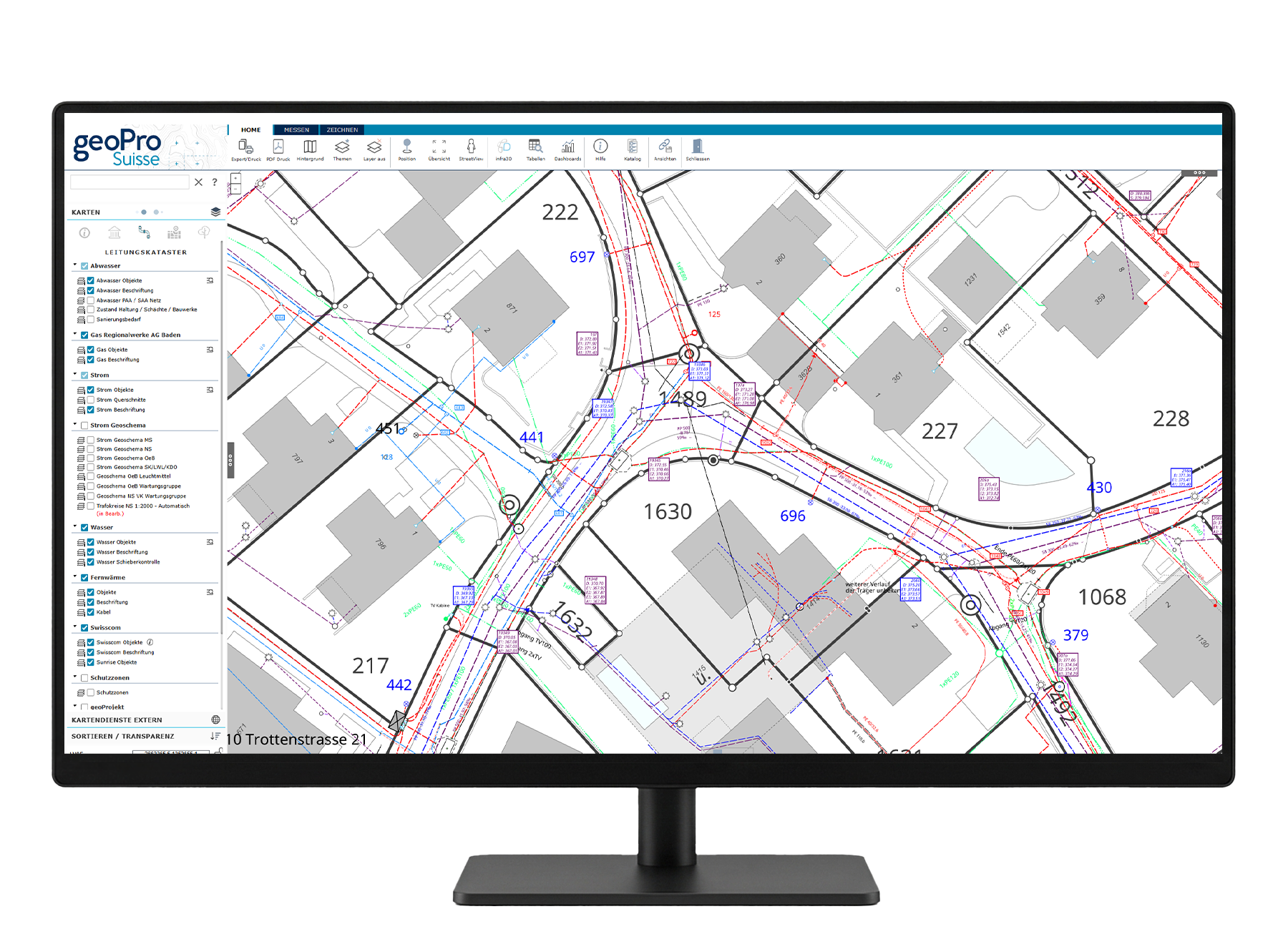 Monitor zeigt eine digitale Karte mit Gebäuden, Leitungen und Infrastrukturdaten im geoPro Suisse Geoportal.