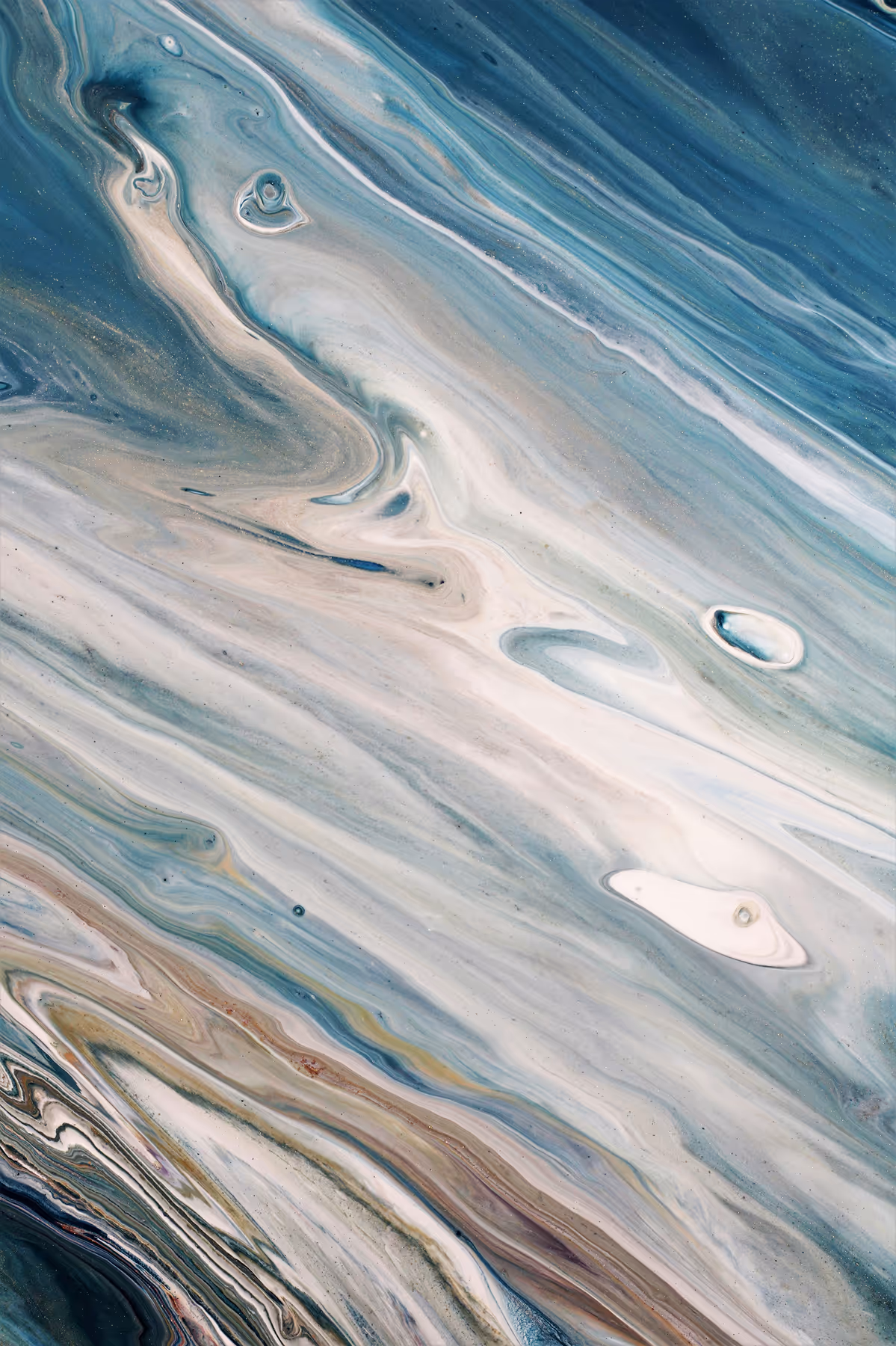 Abstract fluid art with swirling patterns in blue, white, beige, and brown tones.