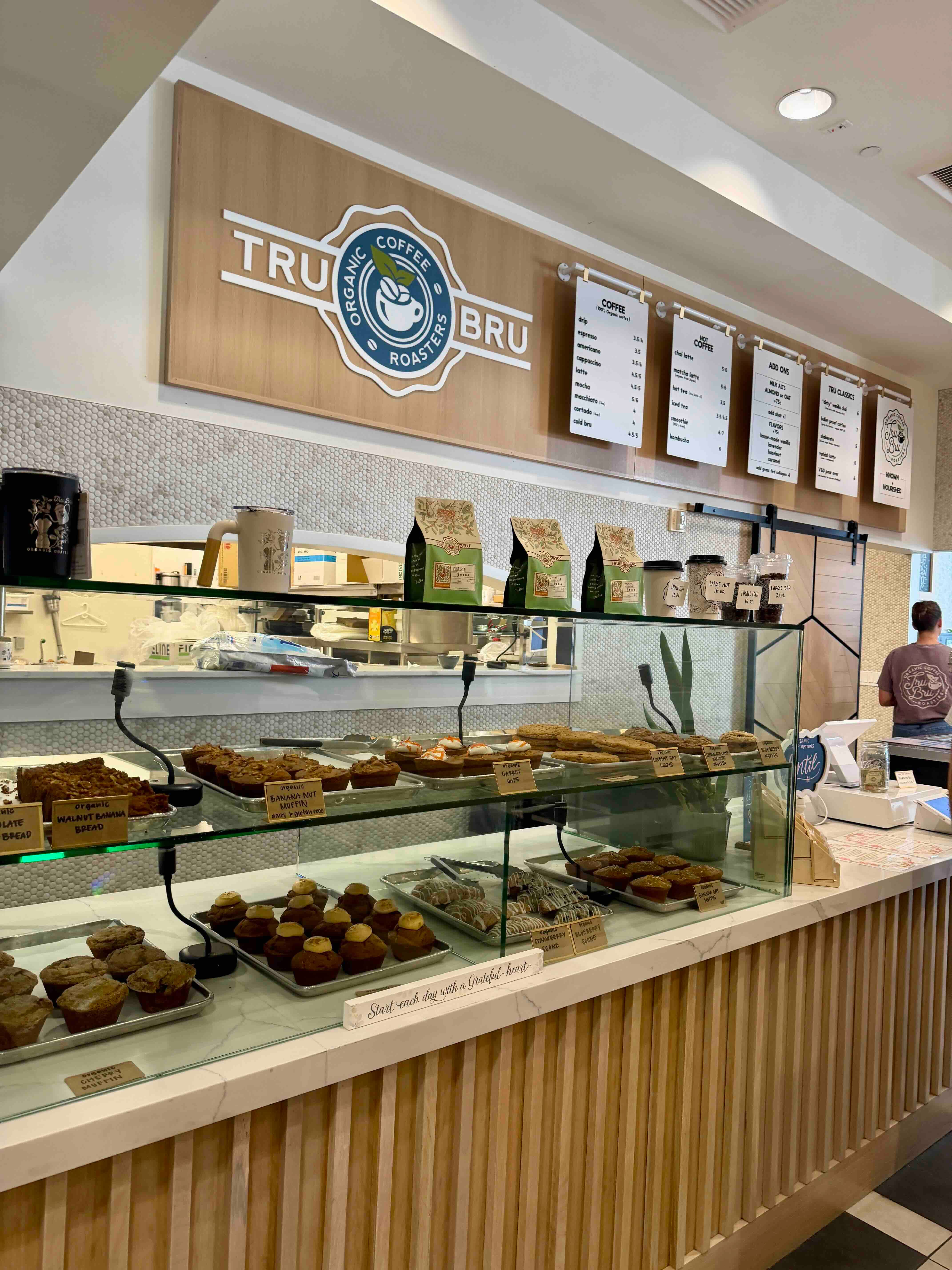 Fresh pastries and coffee drinks on display at Tru Bru Coffee's Irvine location.
