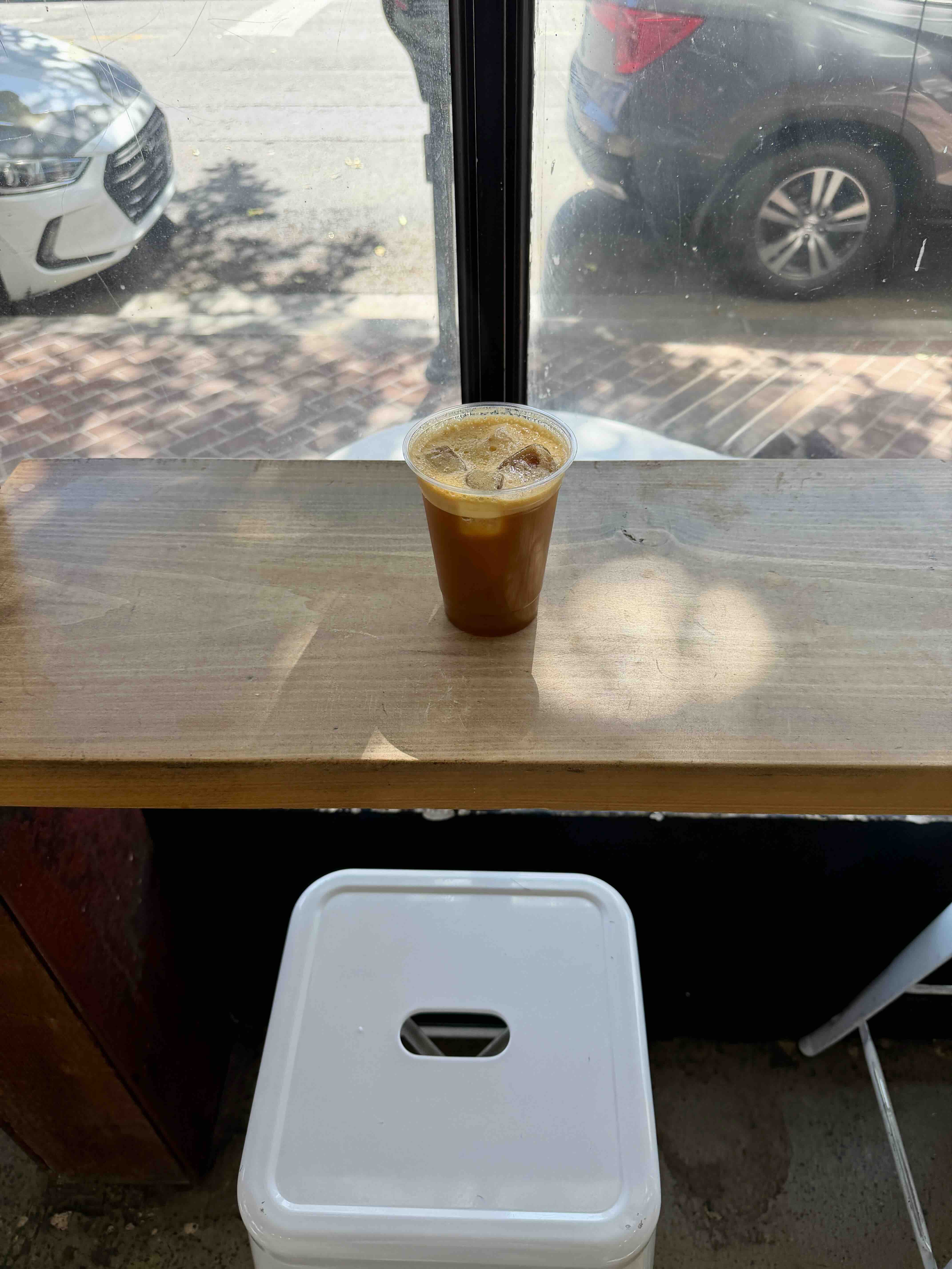Interior seating area at Hopper & Burr in Downtown Santa Ana — bright corner space with natural light.