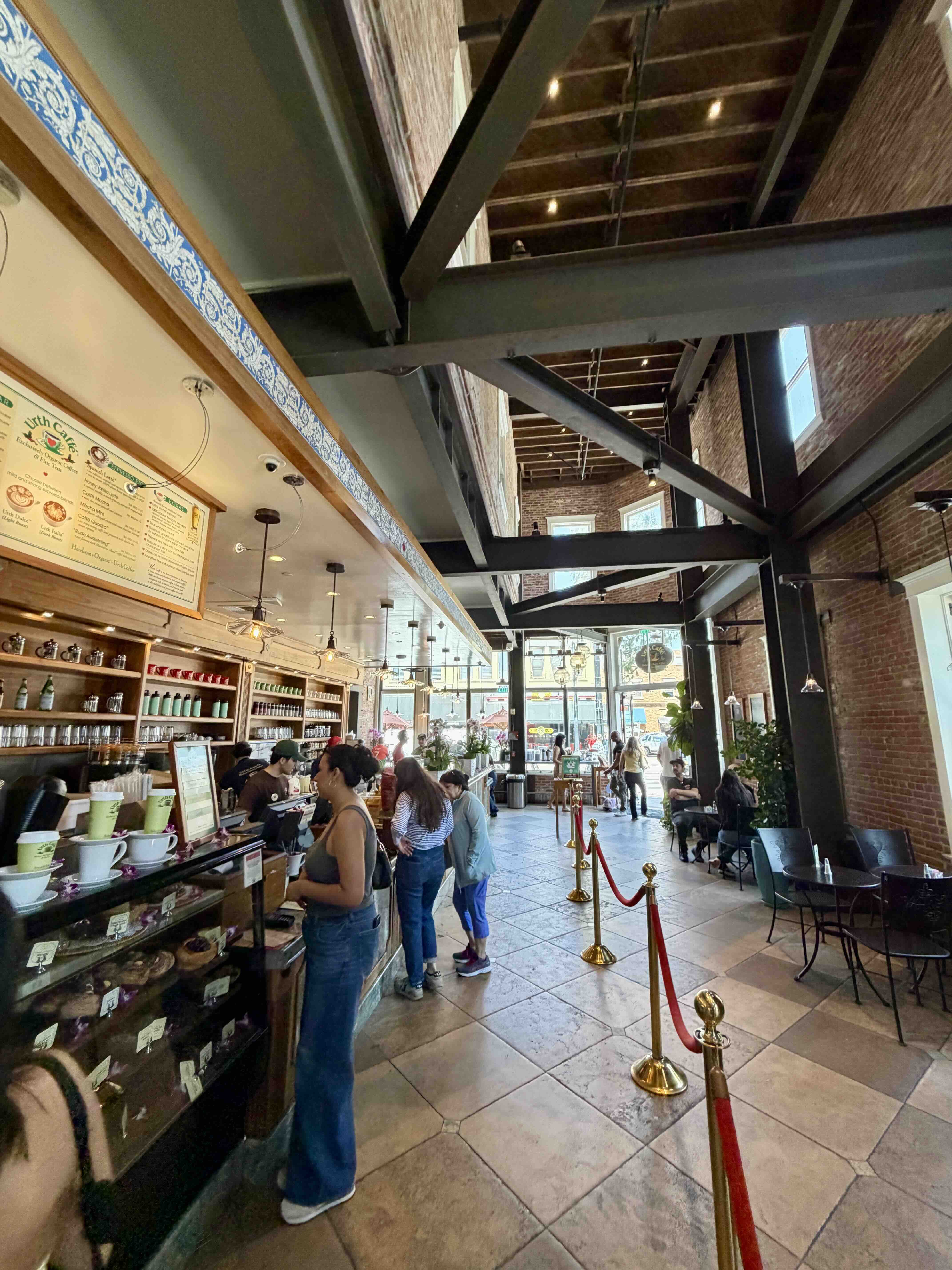 Interior counter and coffee bar at Urth Caffé Orange, inside the restored 19th-century landmark on Chapman Avenue.