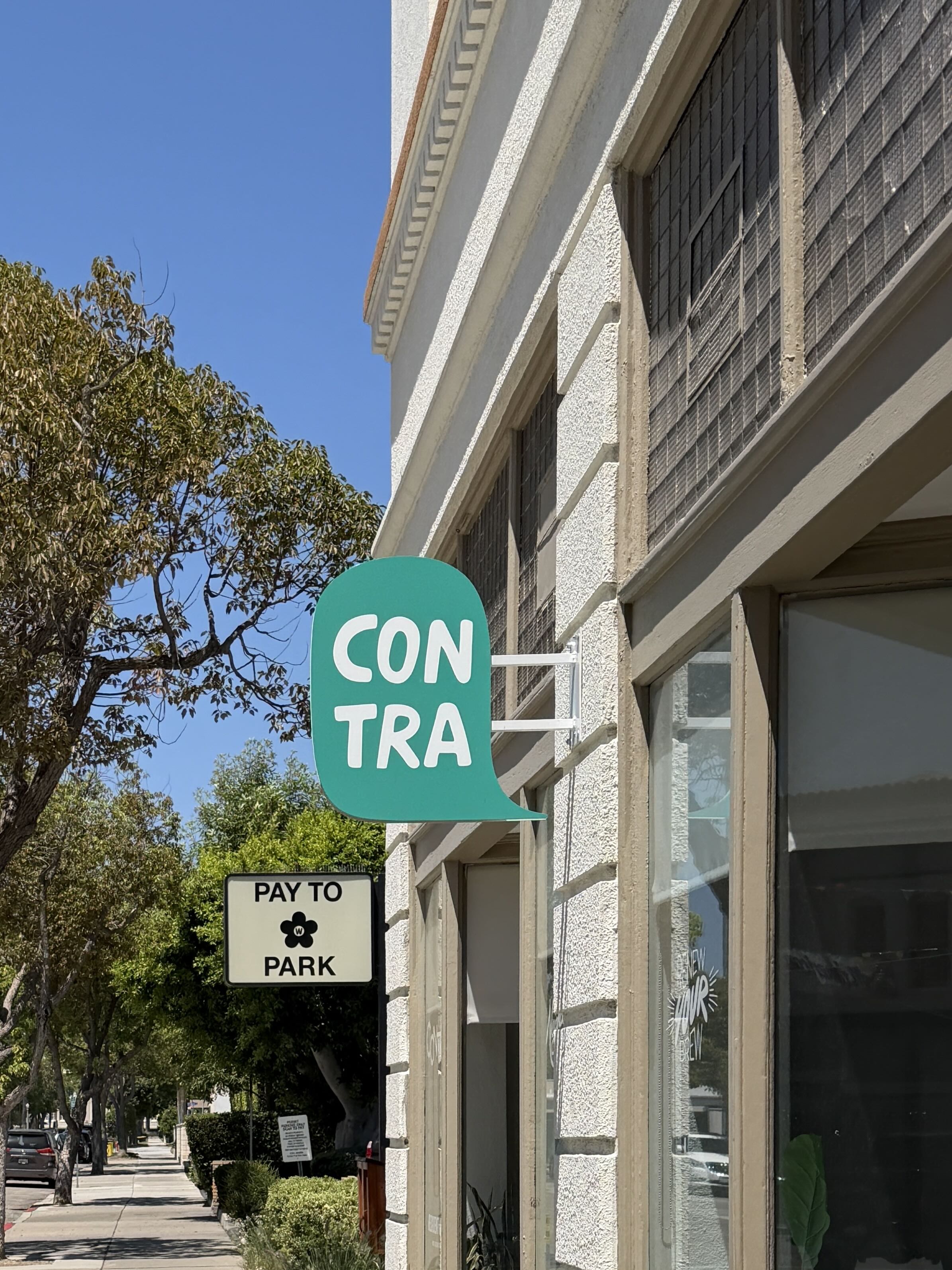 CONTRA Coffee & Tea storefront on North Orange Street in Old Towne Orange, with the CONTRA sign visible.
