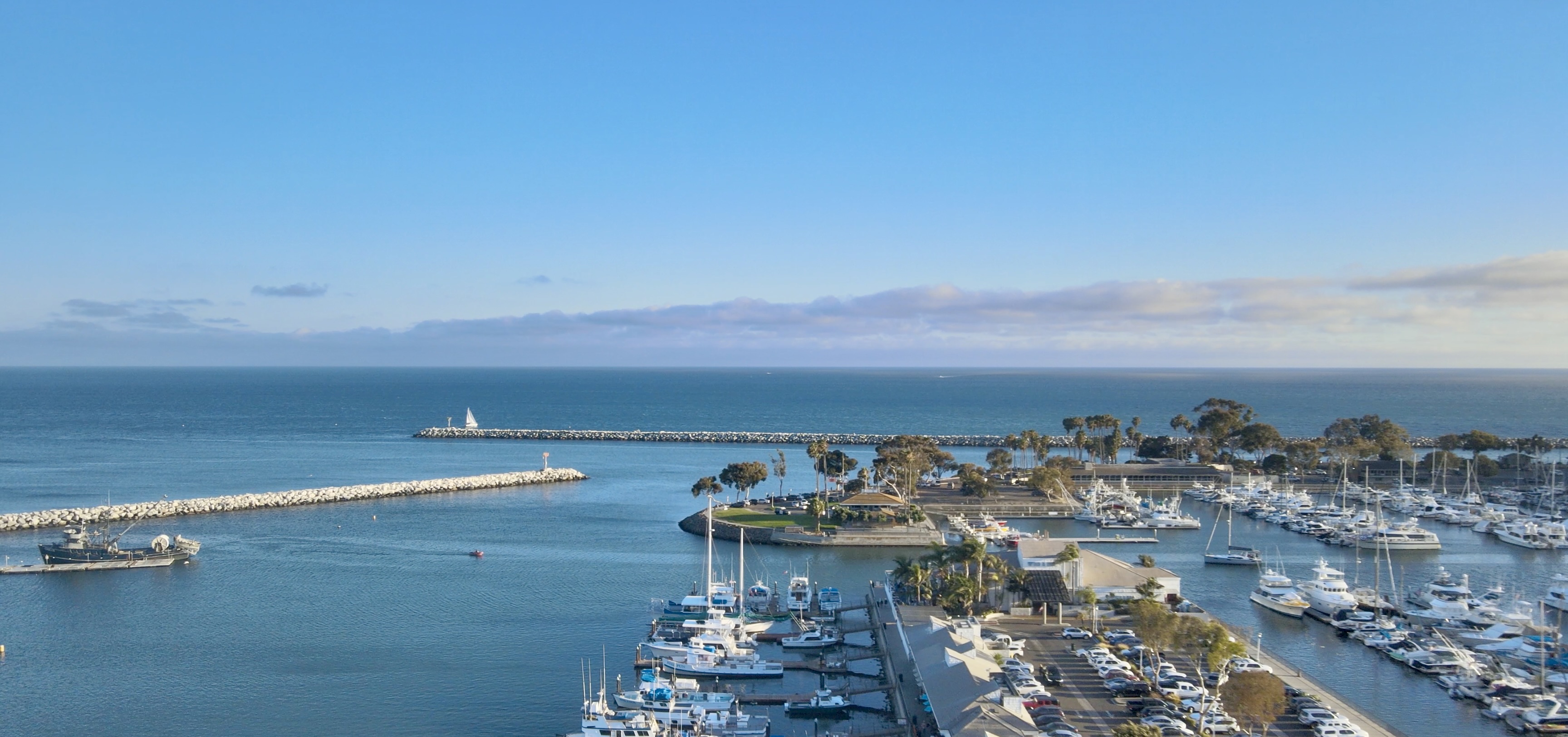 Dana Point Harbor: marina, breakwater, and coastal bluffs on the south Orange County coast.
