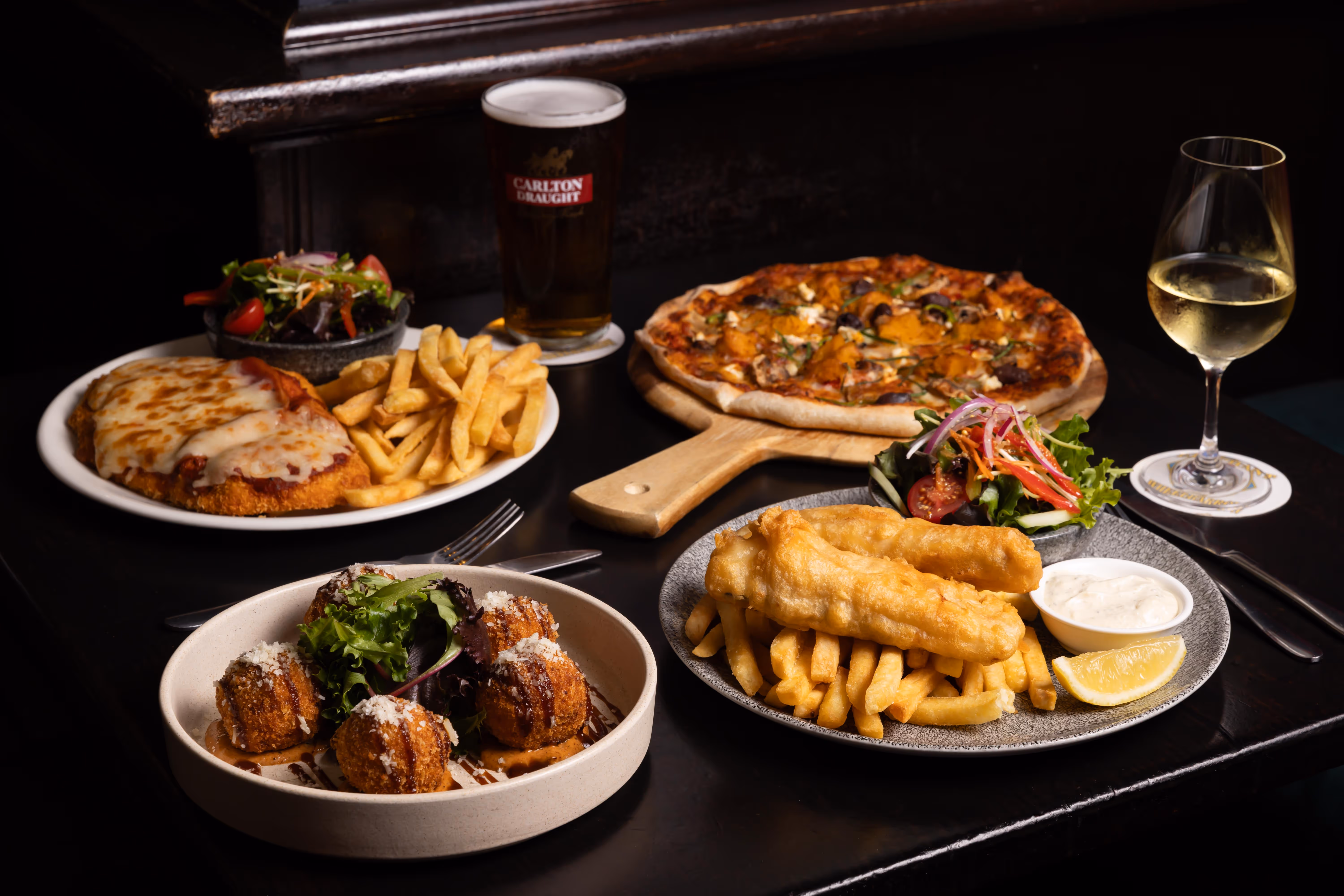 Crispy Calamari Rings, Oysters, Warm Beef Salad, and Chips.