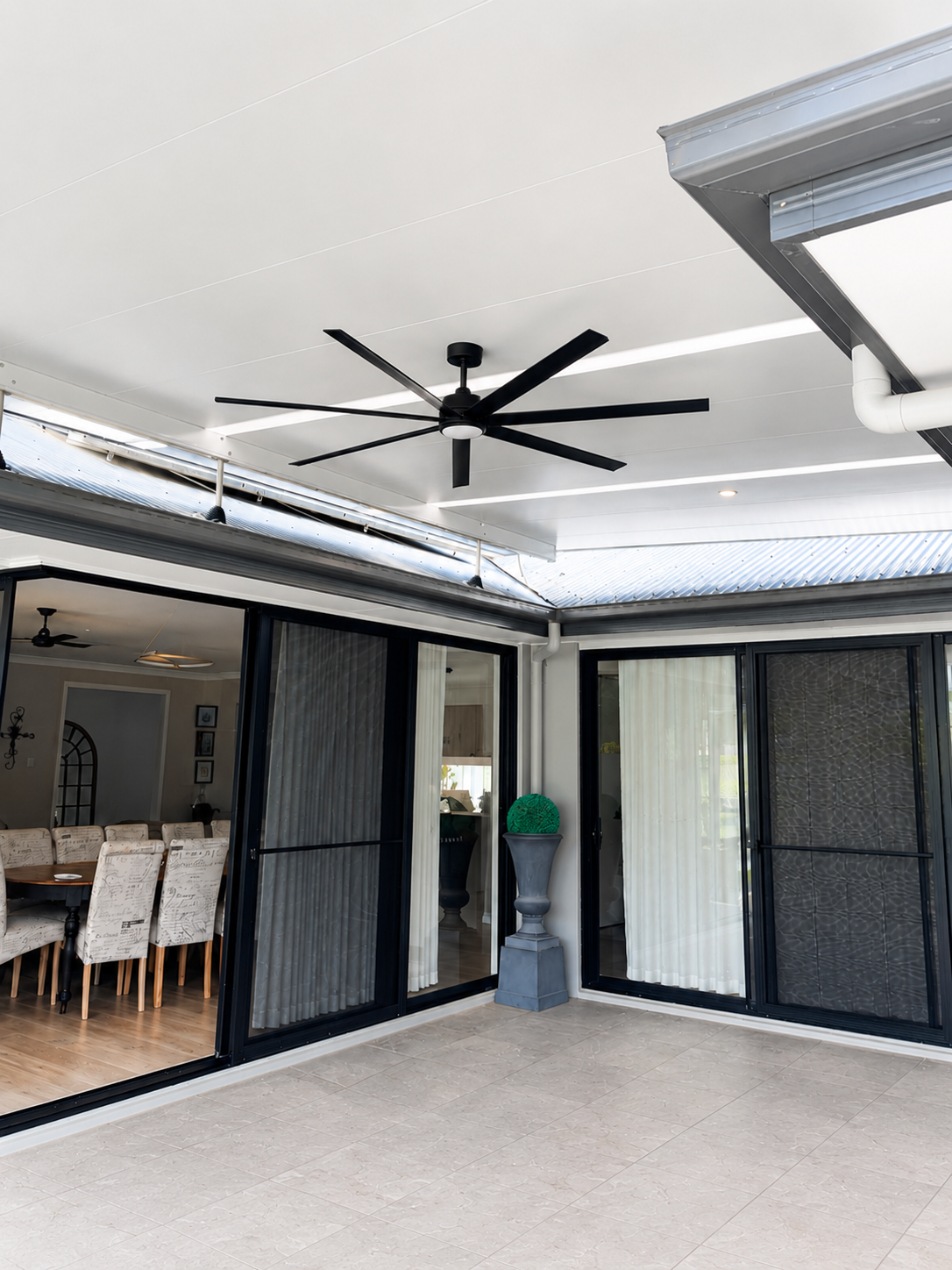Eclipse Opening Roof installed over an indoor swimming pool with adjustable louvres.